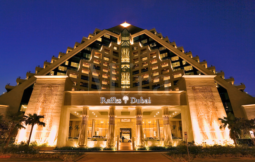 Dubai. Raffles Hotel built on an Egyptian theme and adjacent to the Wafi Mall, a luxurious shopping centre/center. Evening.